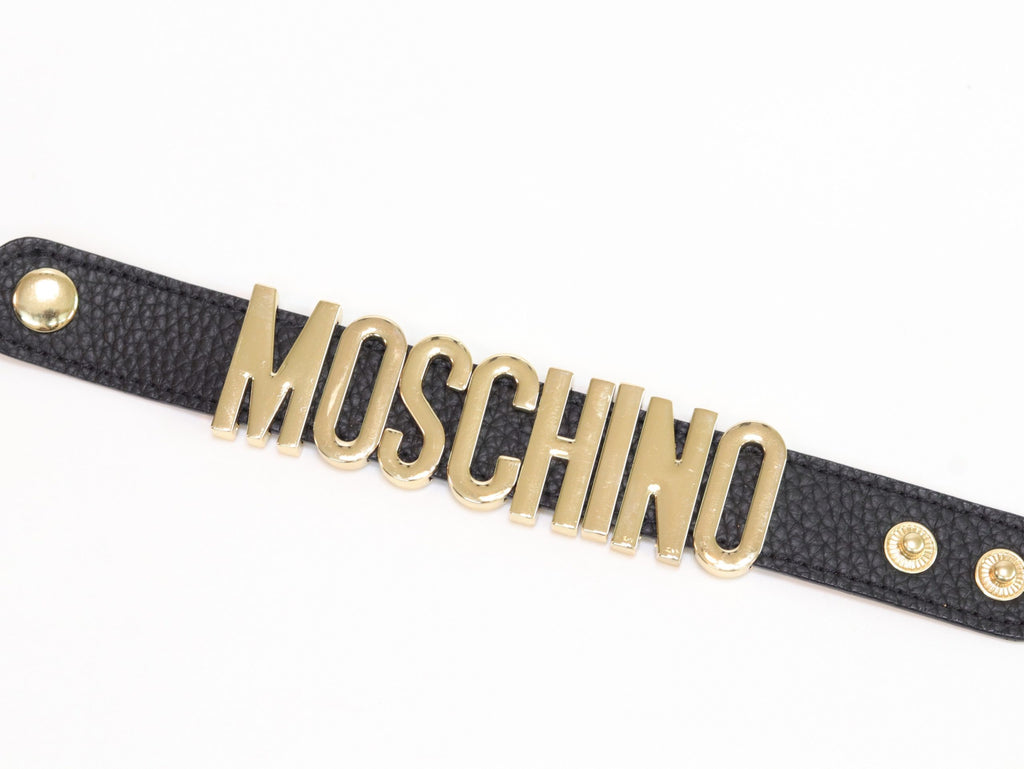 Alphabet M black colour bracelet in gold finish
