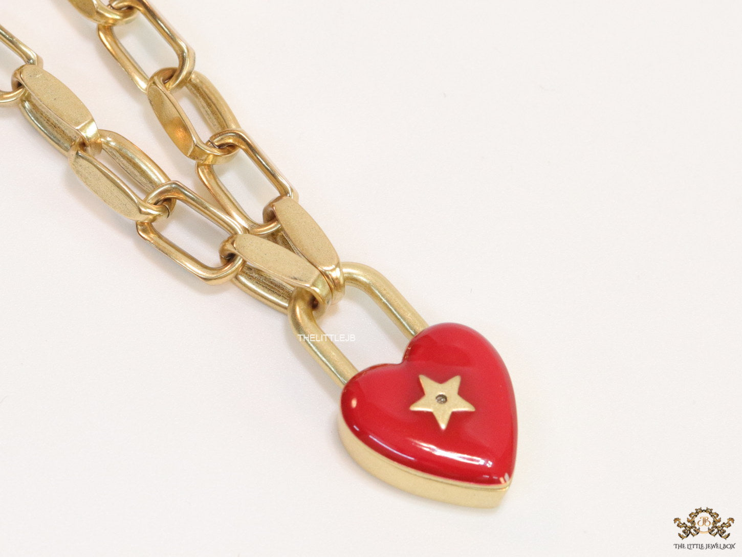 Gold plated link chain bracelet with heart shape lock