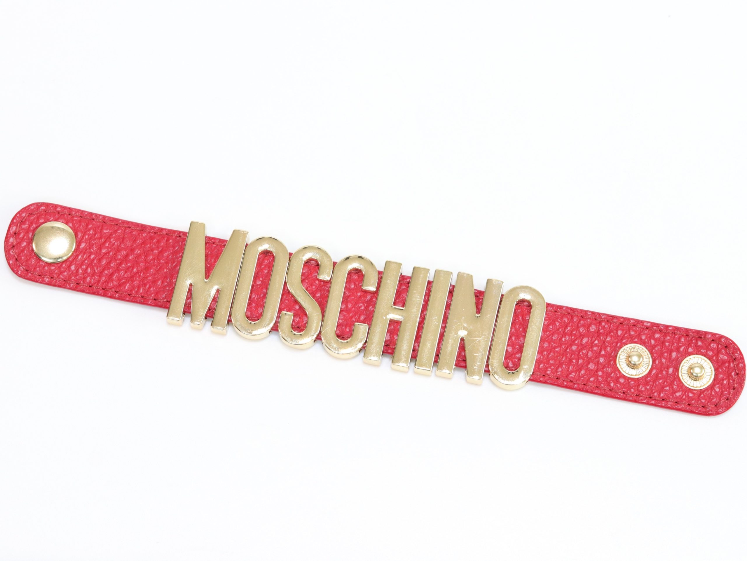 Alphabet M red colour bracelet in gold finish