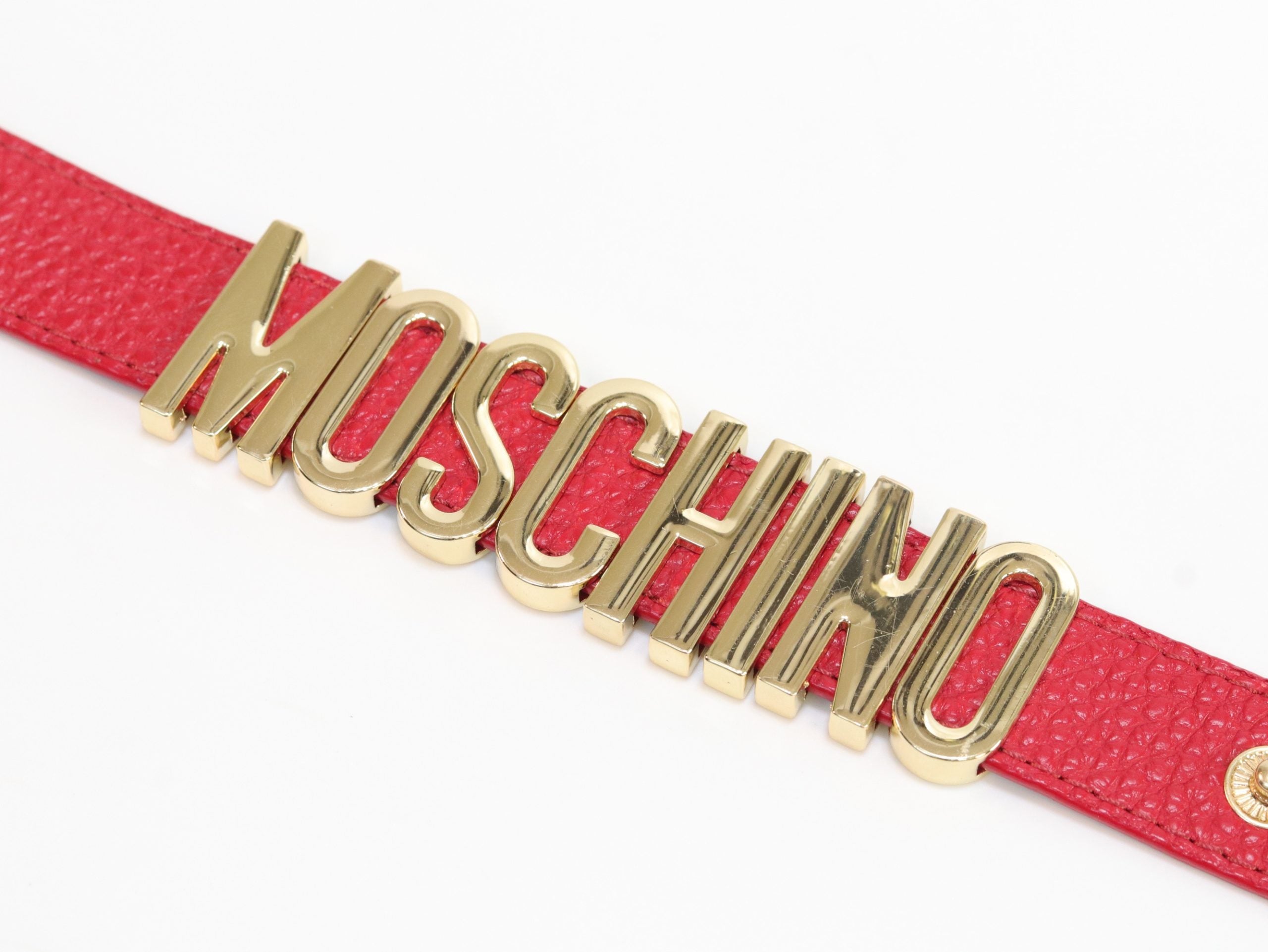 Alphabet M red colour bracelet in gold finish
