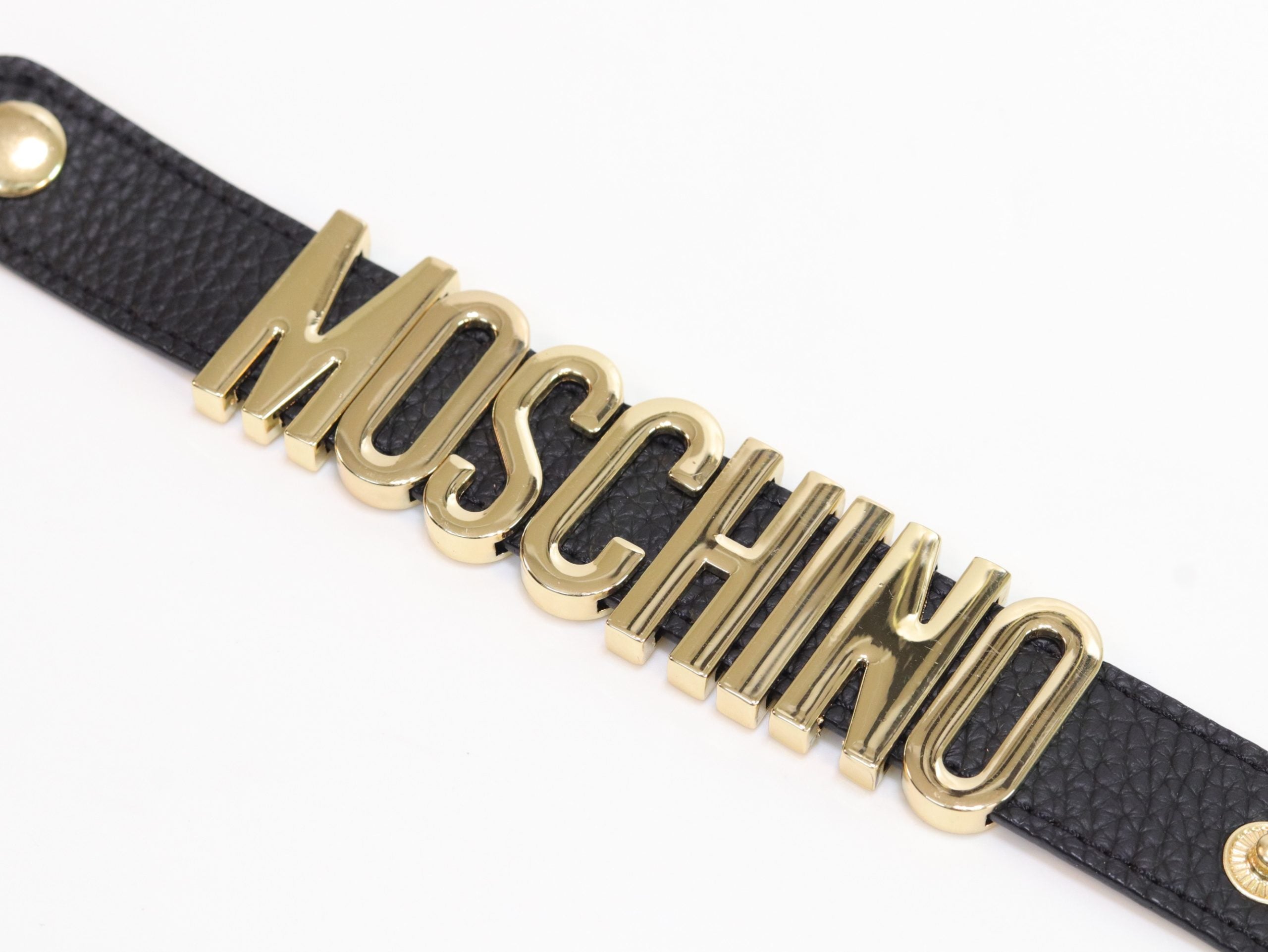 Alphabet M black colour bracelet in gold finish