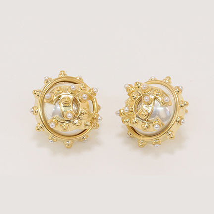 Double C gold spiked studs