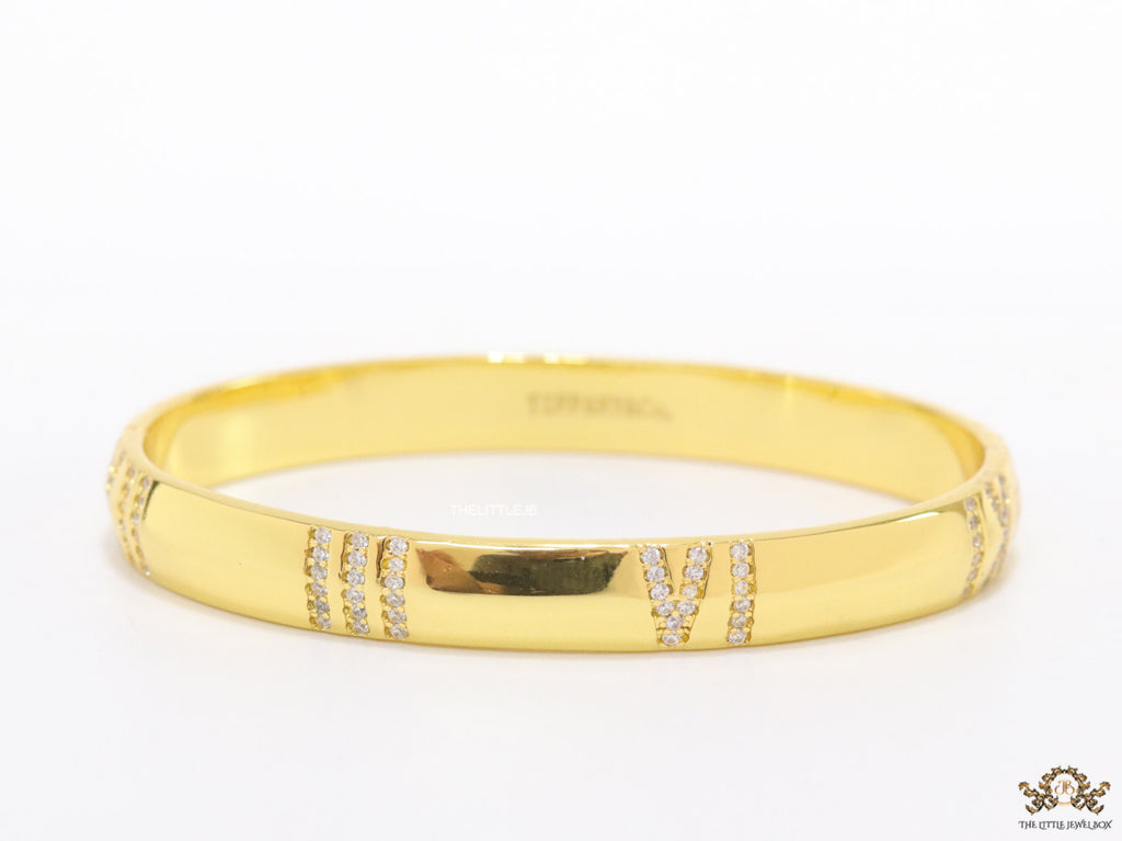 Gold bracelet with cz roman numerals