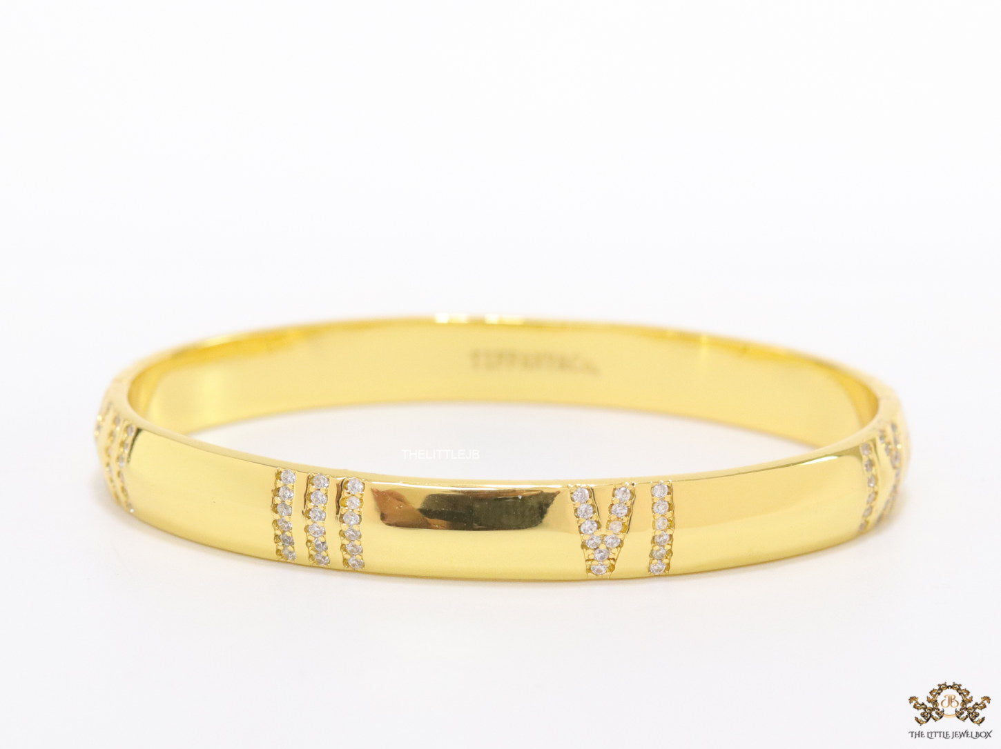 Gold bracelet with cz roman numerals