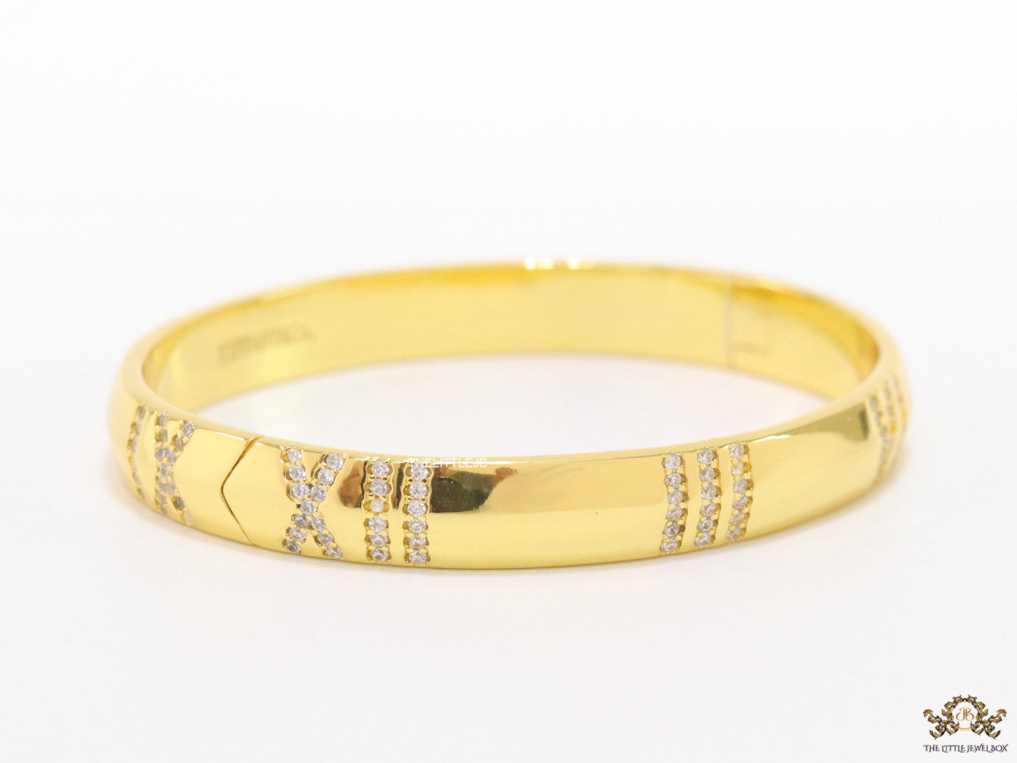Gold bracelet with cz roman numerals