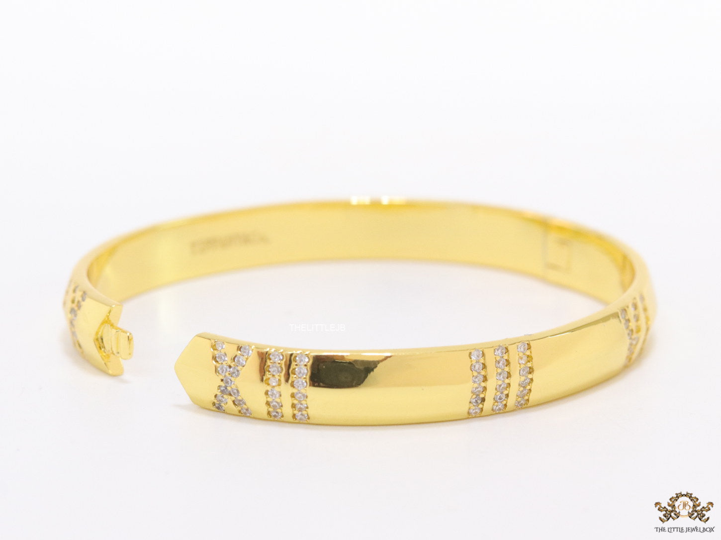 Gold bracelet with cz roman numerals