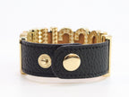 Alphabet M black colour bracelet in gold finish