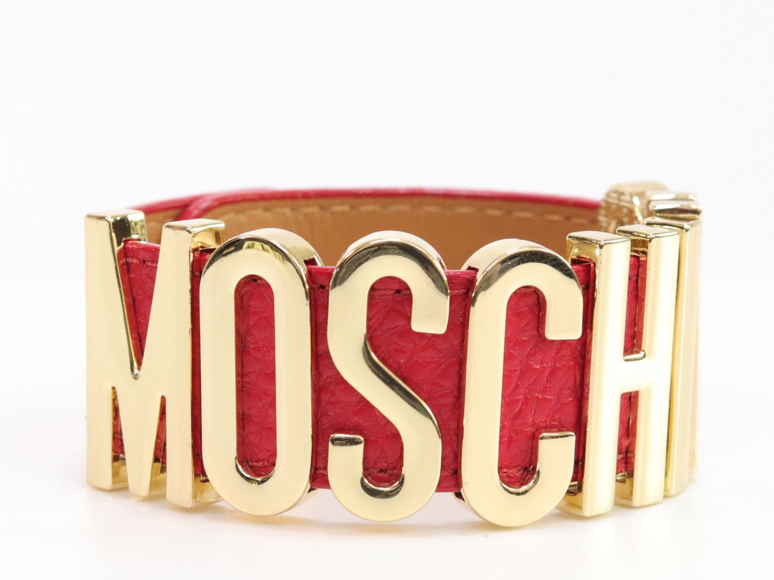 Alphabet M red colour bracelet in gold finish