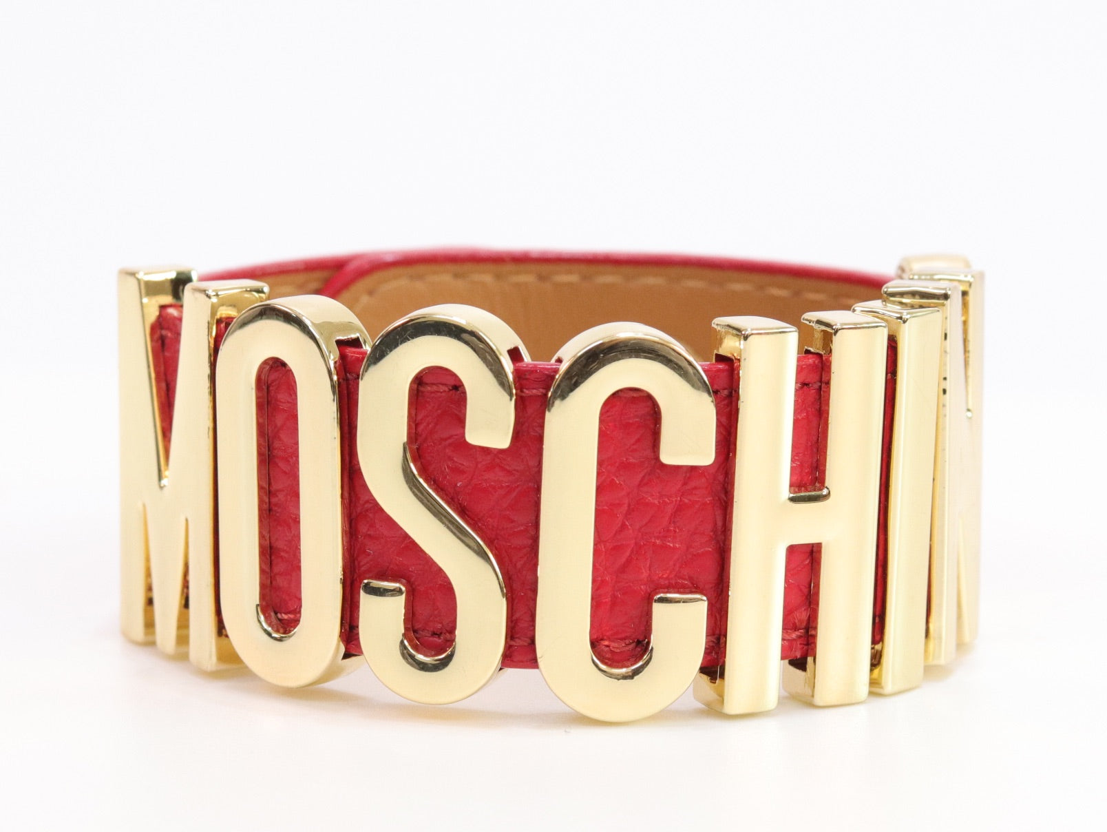 Alphabet M red colour bracelet in gold finish