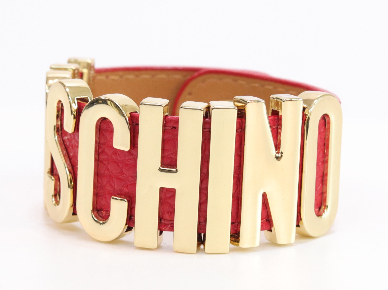 Alphabet M red colour bracelet in gold finish