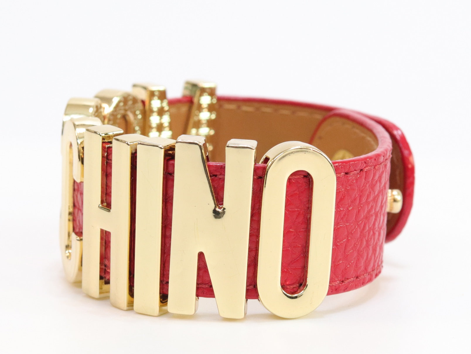 Alphabet M red colour bracelet in gold finish