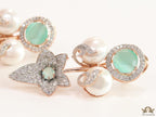 Cz flower earrings with shell pearls and light green stones