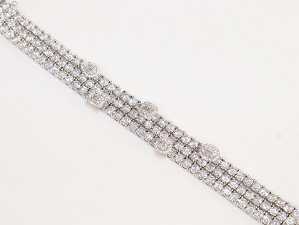 Triple Stacked multiple cut CZ bracelet in platinum finish