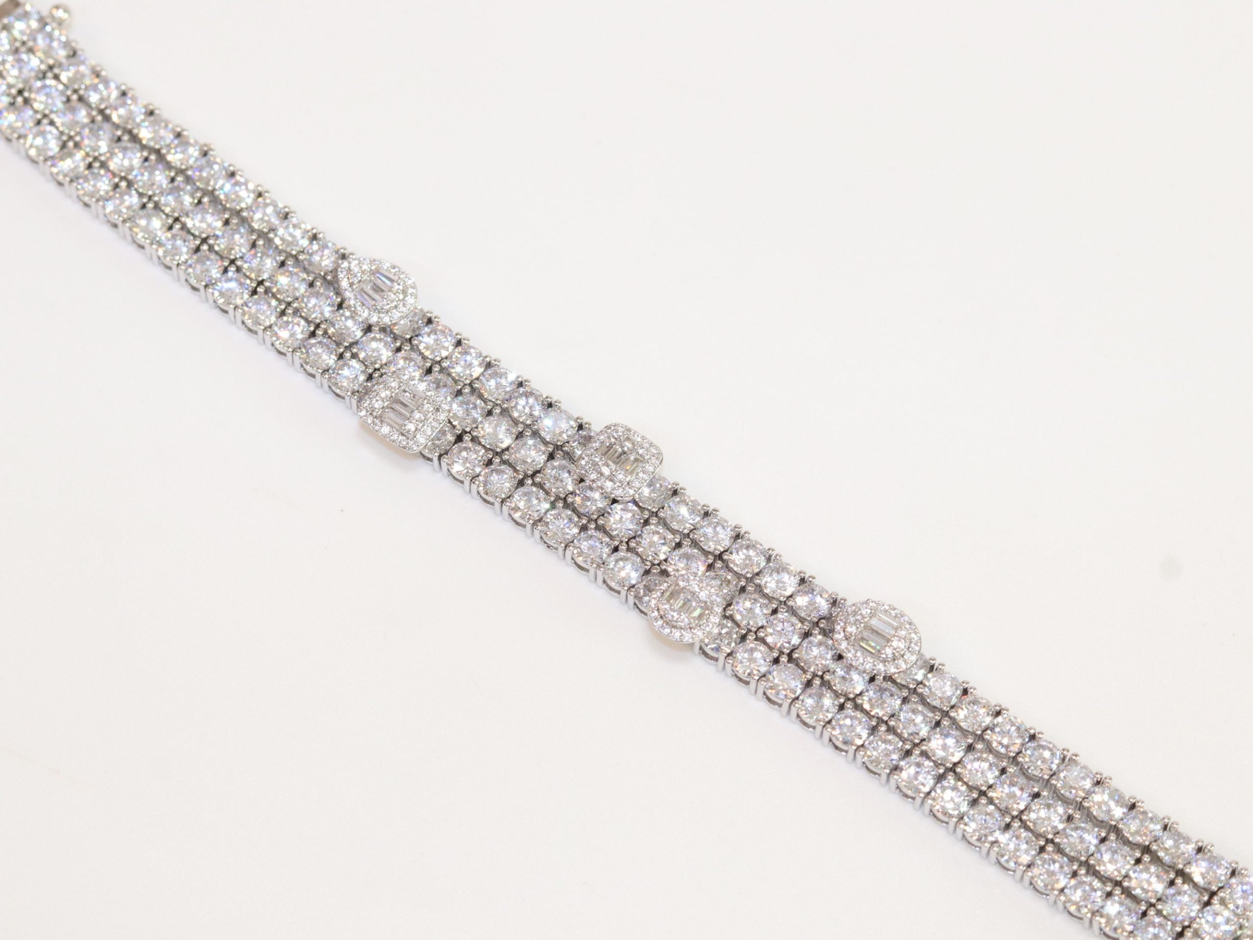 Triple Stacked multiple cut CZ bracelet in platinum finish