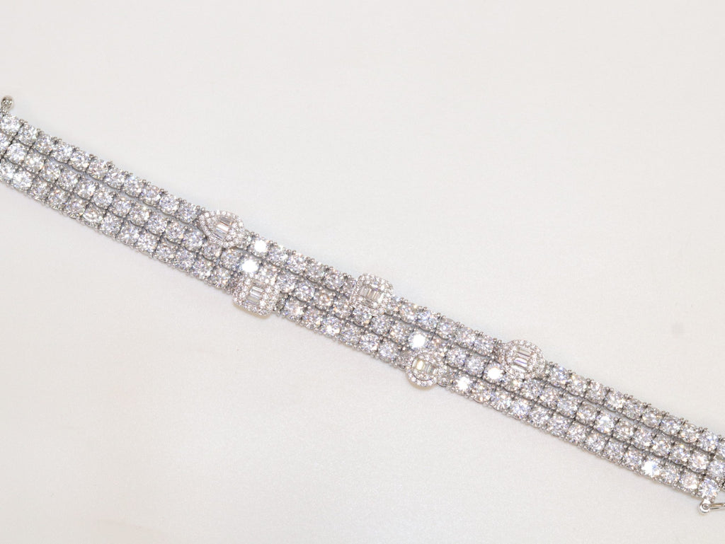 Triple Stacked multiple cut CZ bracelet in platinum finish