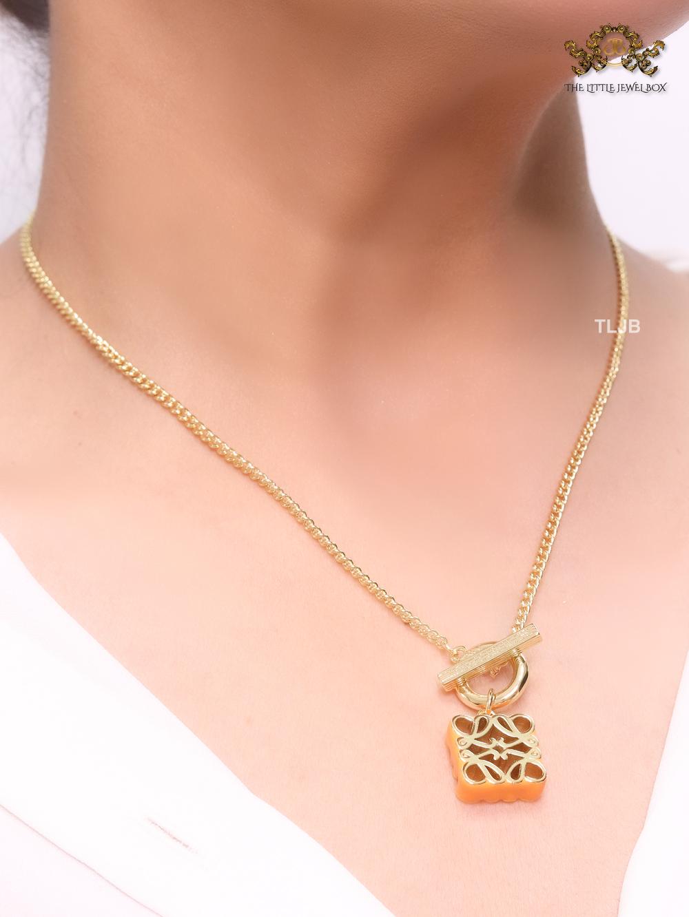 Alphabet L yellow & gold sleek pendant