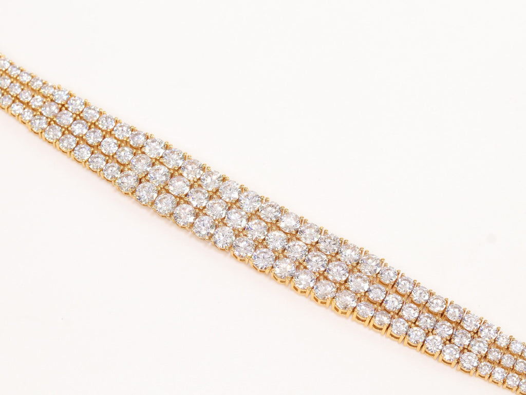 Triple Stacked CZ bracelet in gold finish
