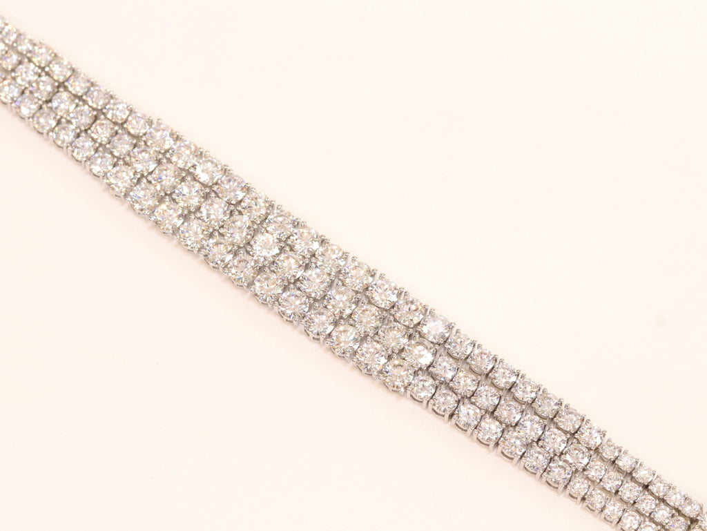 Triple Stacked CZ bracelet in platinum finish