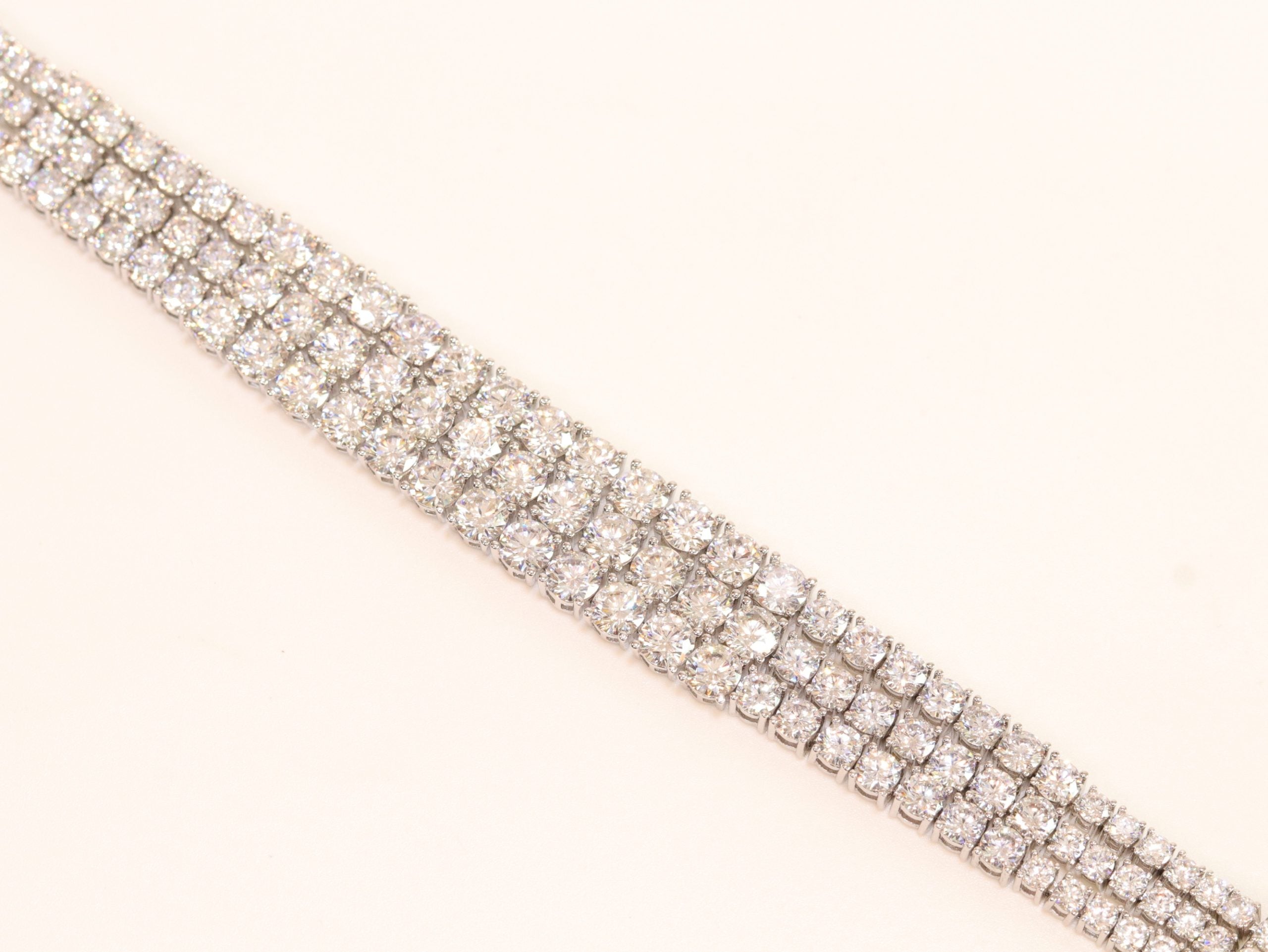 Triple Stacked CZ bracelet in platinum finish