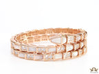 Triple line rose gold plated minimal serpentine bracelet with cubic zirconia stones and pearl white stones.