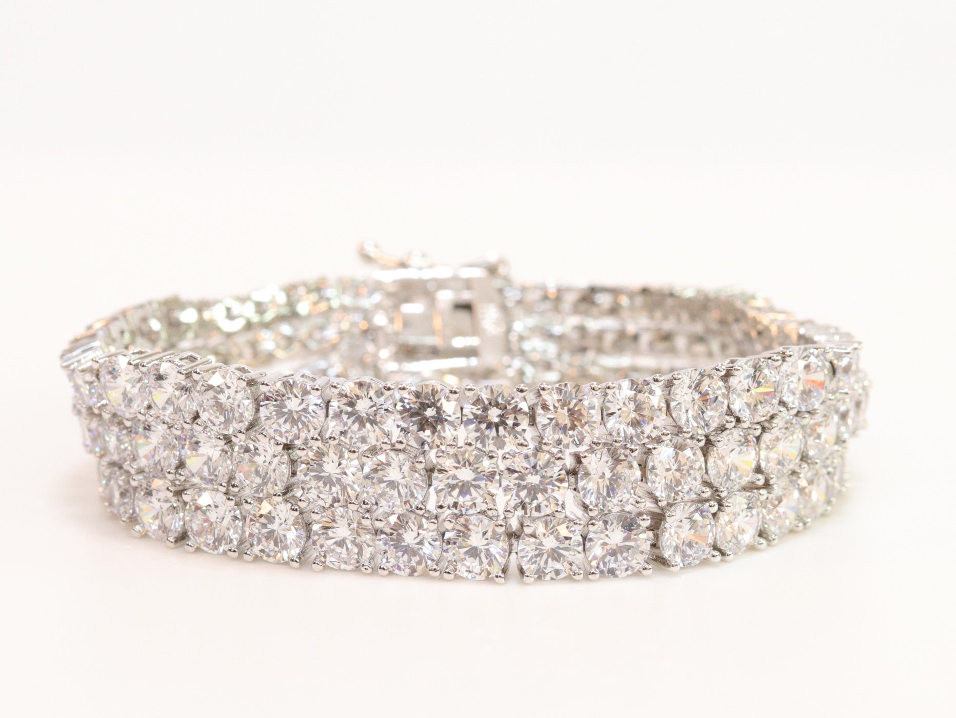 Triple Stacked CZ bracelet in platinum finish