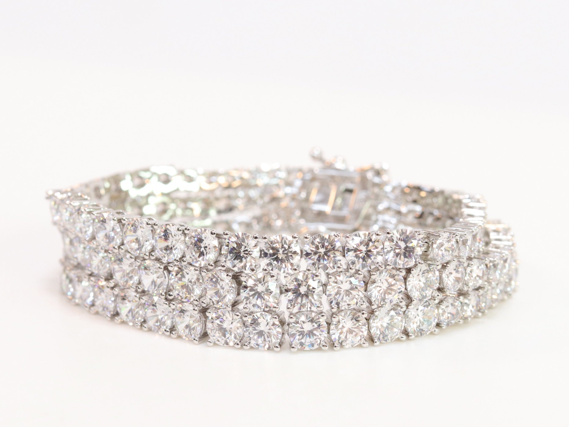 Triple Stacked CZ bracelet in platinum finish