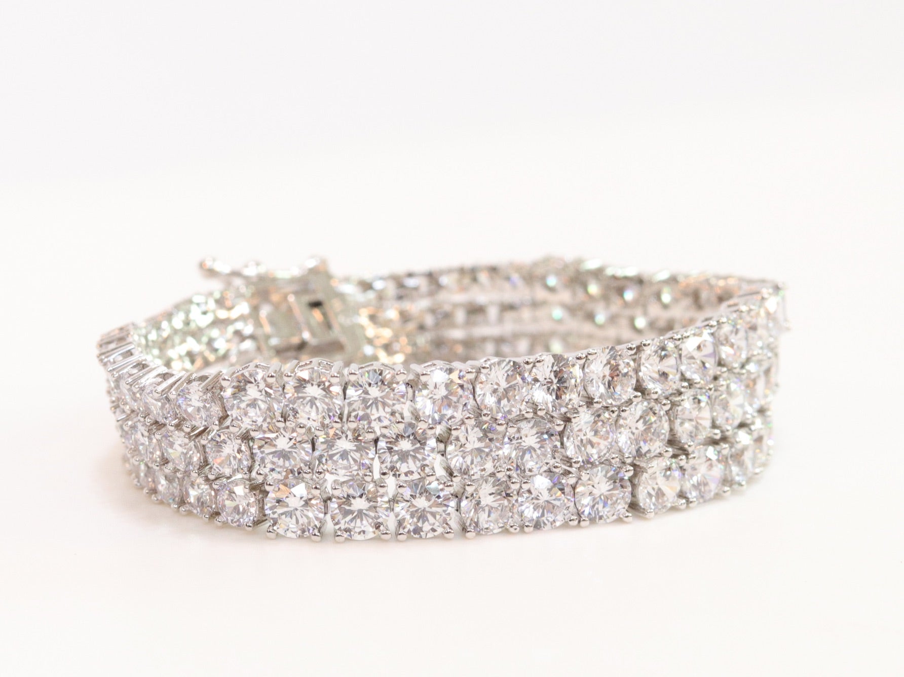 Triple Stacked CZ bracelet in platinum finish