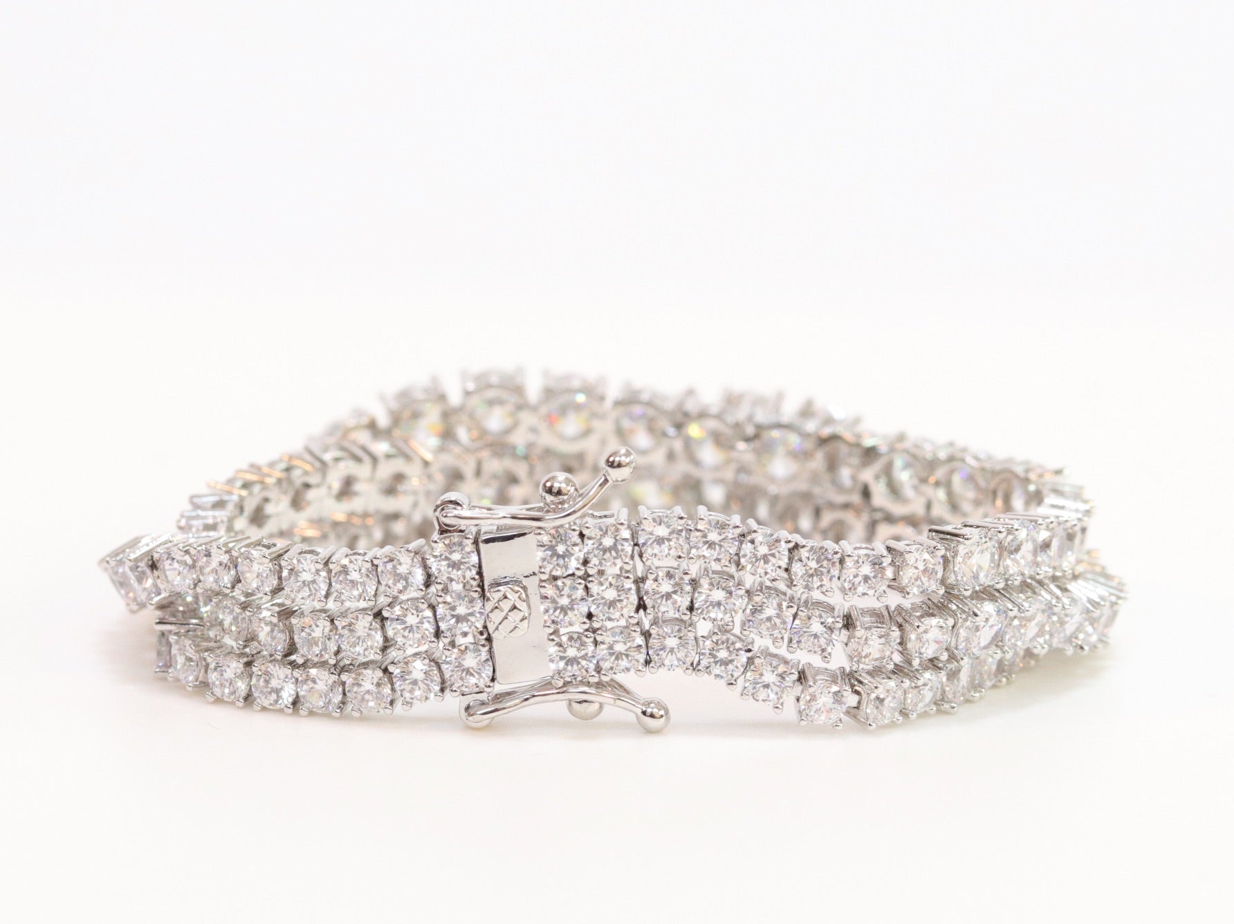 Triple Stacked CZ bracelet in platinum finish