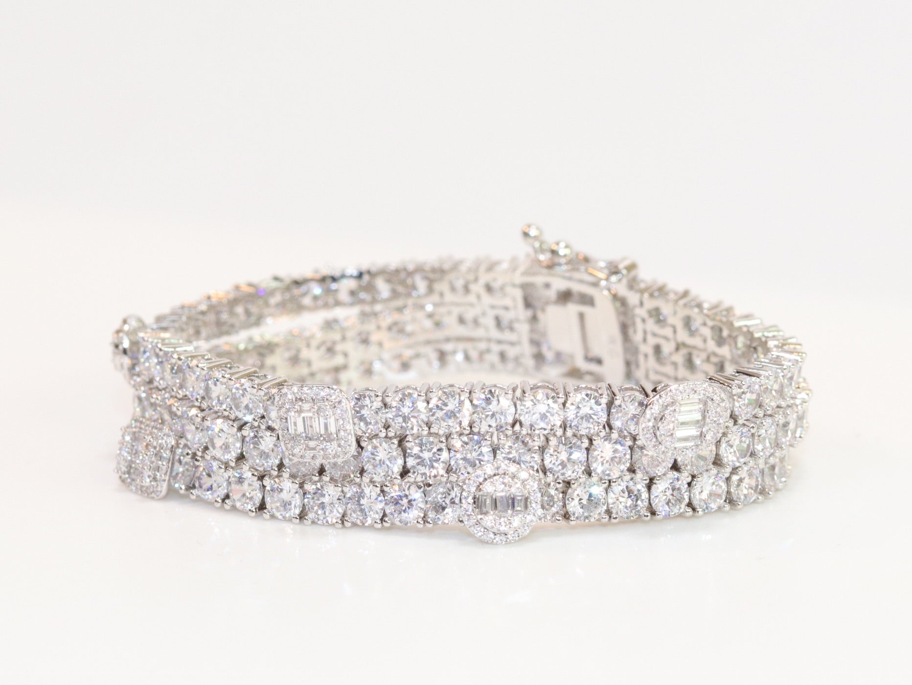 Triple Stacked multiple cut CZ bracelet in platinum finish