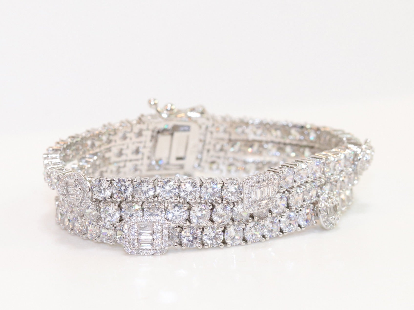 Triple Stacked multiple cut CZ bracelet in platinum finish