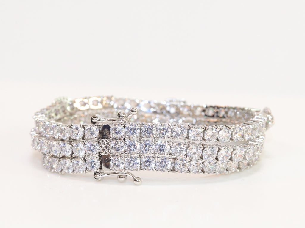 Triple Stacked multiple cut CZ bracelet in platinum finish