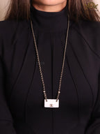 Double C enamel Bag on a black and gold chain