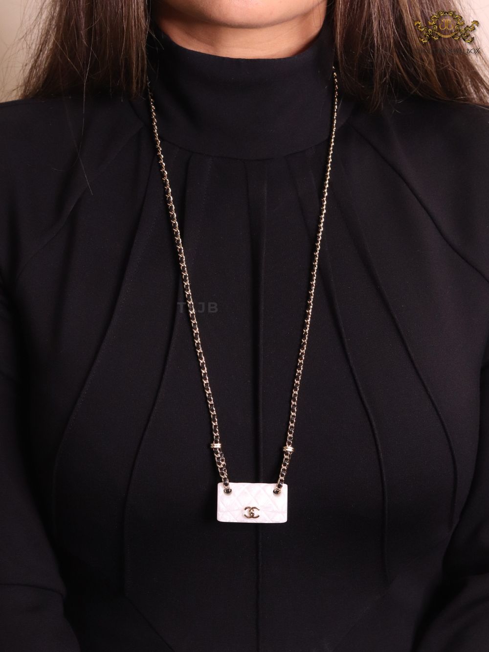 Double C enamel Bag on a black and gold chain