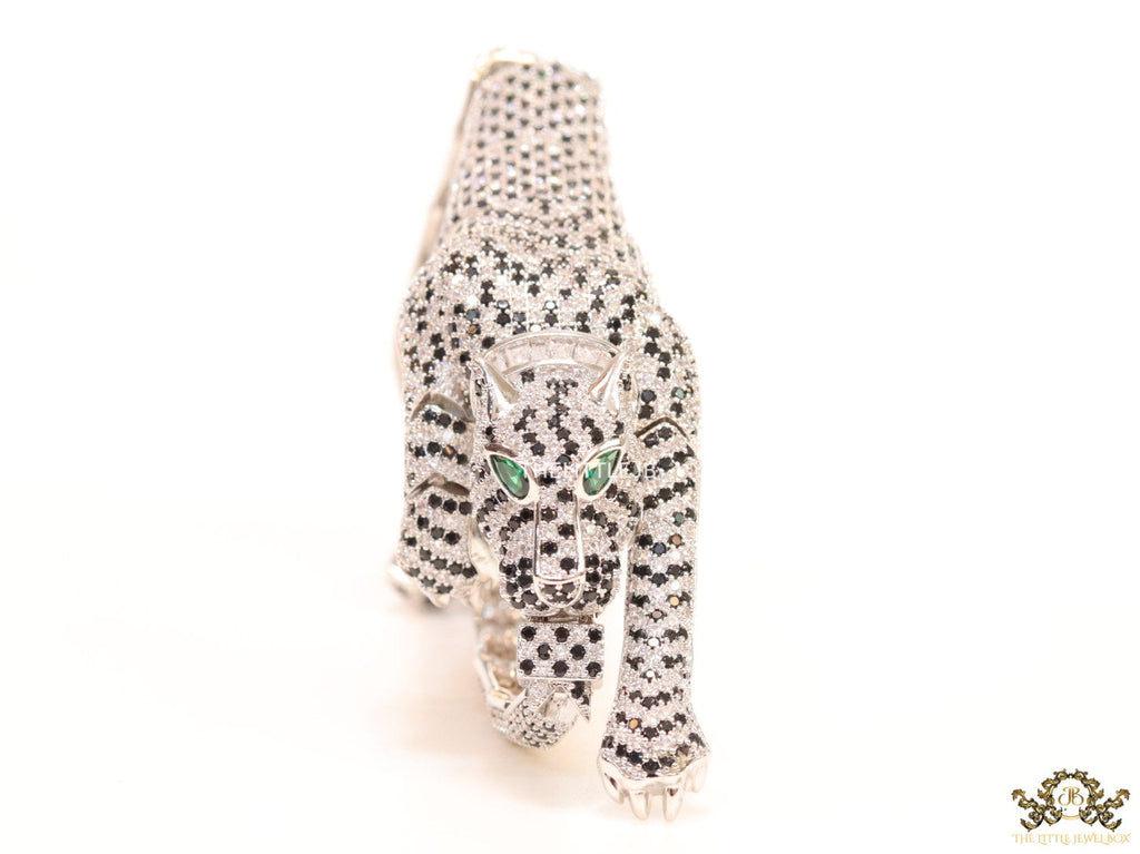 Cubic zirconia stone studded panther motif with emerald green colour stone details platinum plated bracelet
