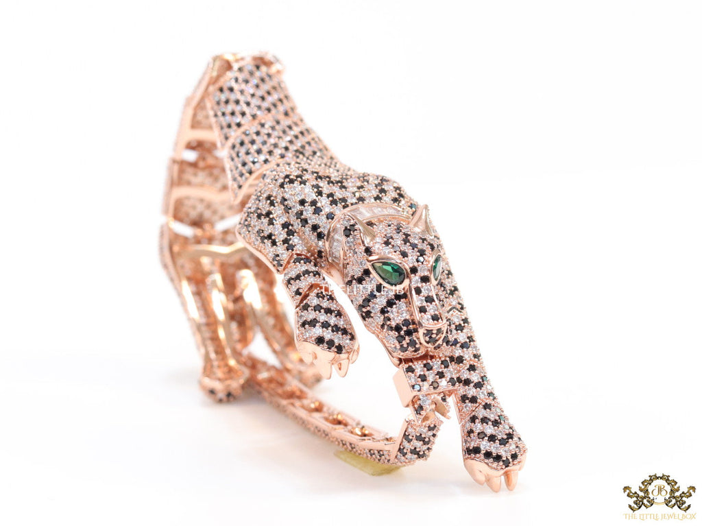 Cubic zirconia stone studded panther motif with emerald green colour stone details rose gold plated bracelet