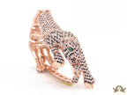Cubic zirconia stone studded panther motif with emerald green colour stone details rose gold plated bracelet