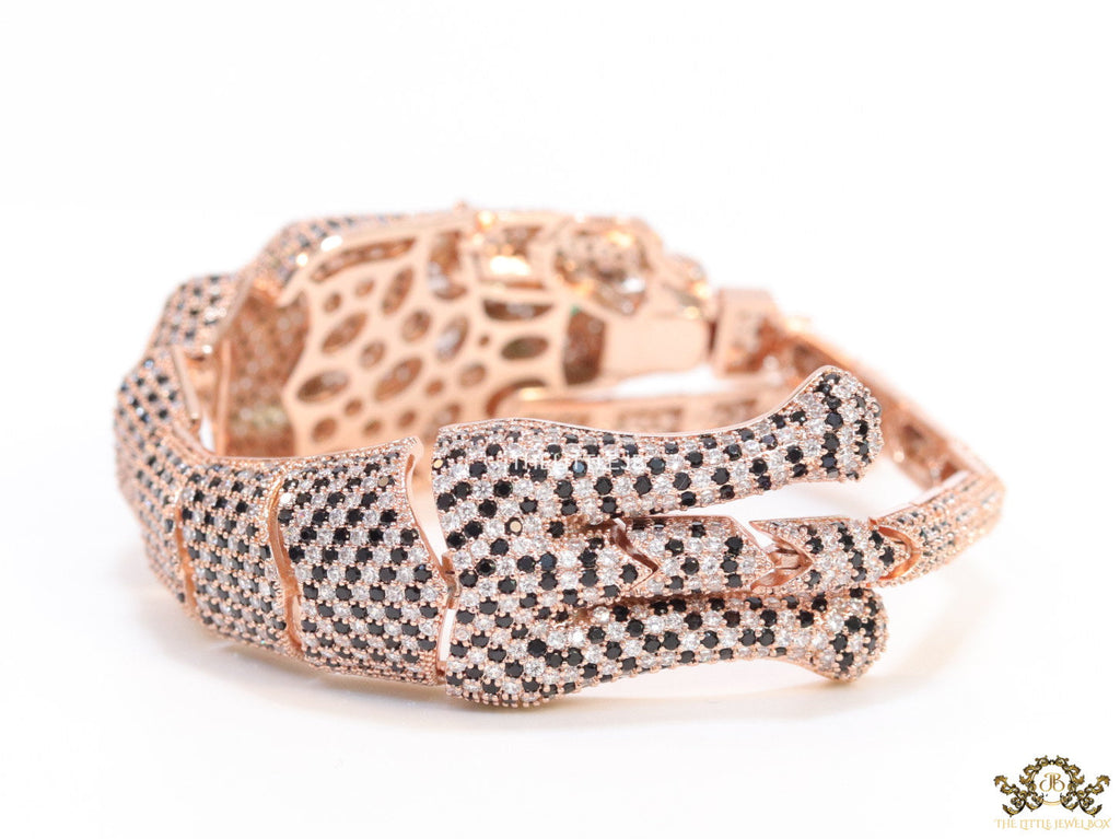 Cubic zirconia stone studded panther motif with emerald green colour stone details rose gold plated bracelet