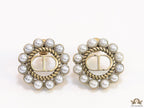 Gold plated round stud earrings with pearl lining and alphabets