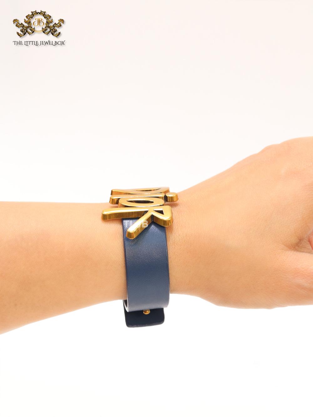 Alphabet D and blue belted bracelet
