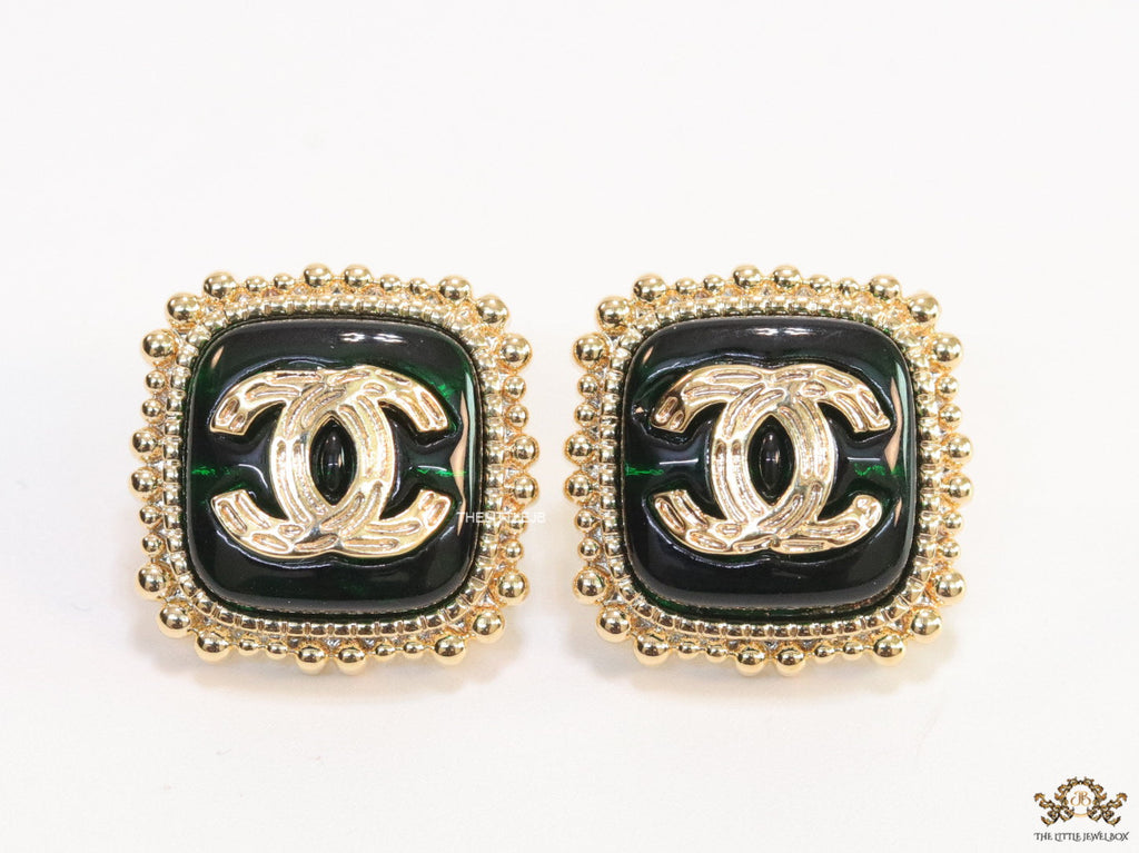 Square deep green and golden stud earrings with golden twin C motifs