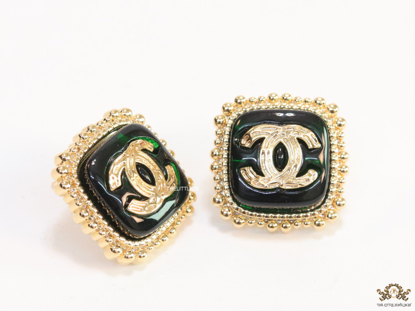 Square deep green and golden stud earrings with golden twin C motifs