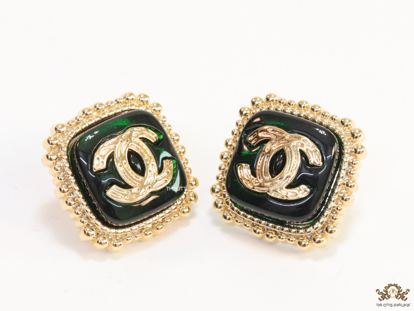 Square deep green and golden stud earrings with golden twin C motifs