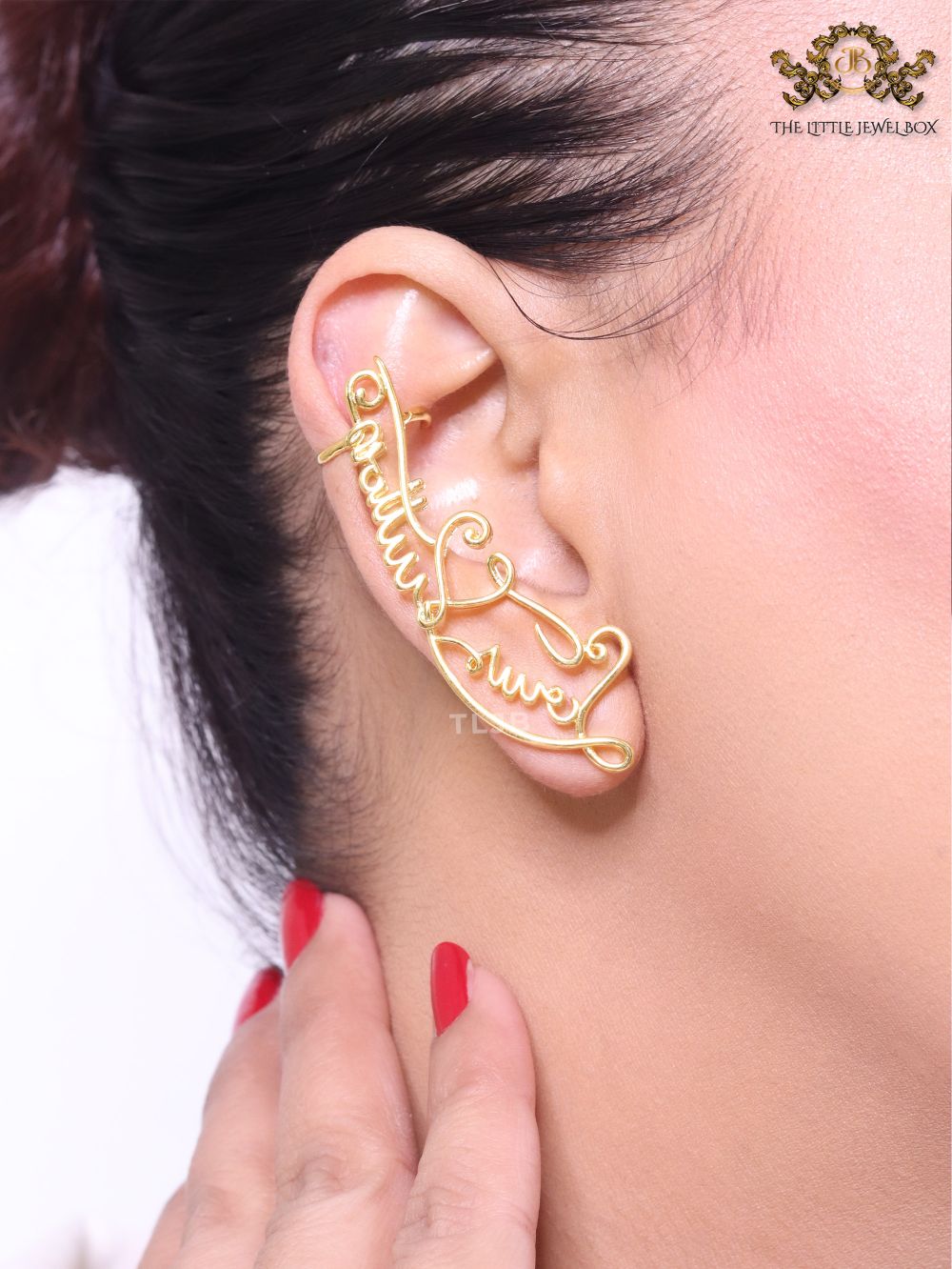 Alphabet L and V ear-cuffs in gold