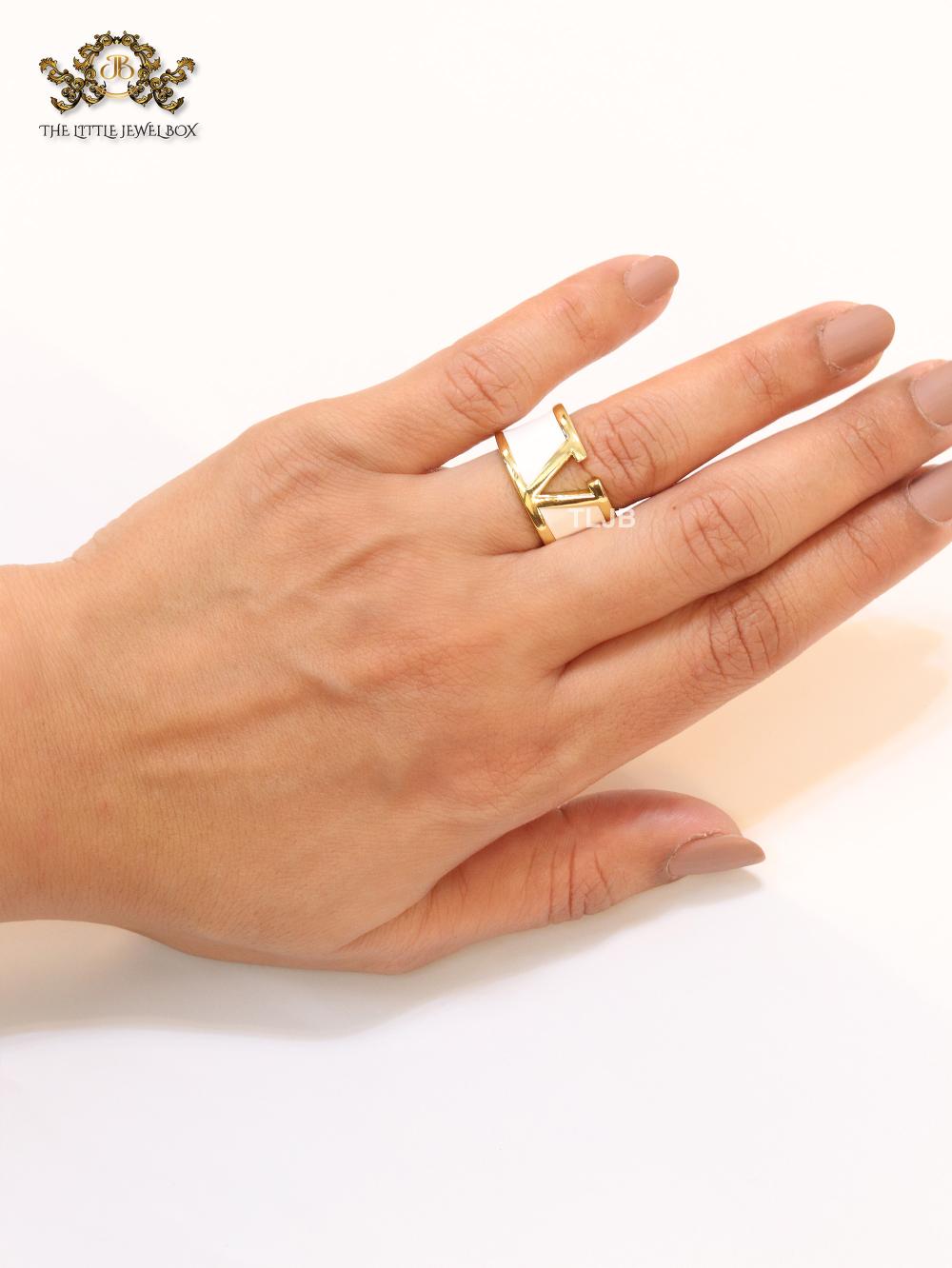 Open V and white enamel bold ring