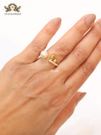 Pearl and alphabet F open ring