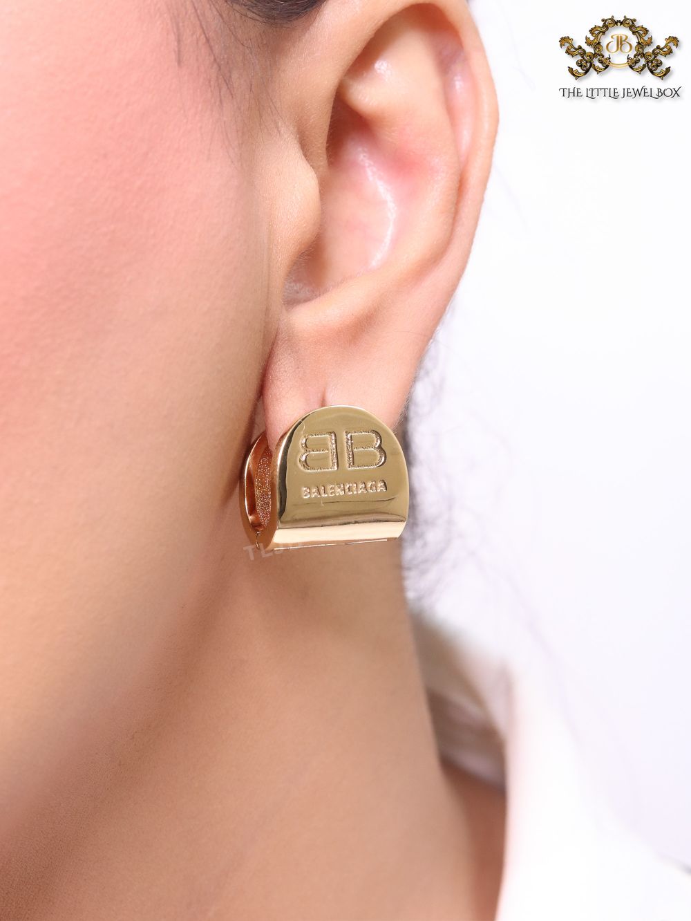 Gold double B studs