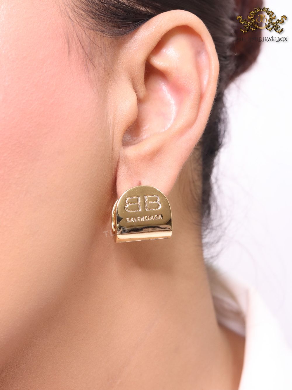 Gold double B studs