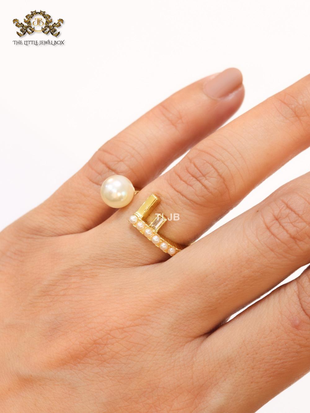 Pearl and alphabet F open ring