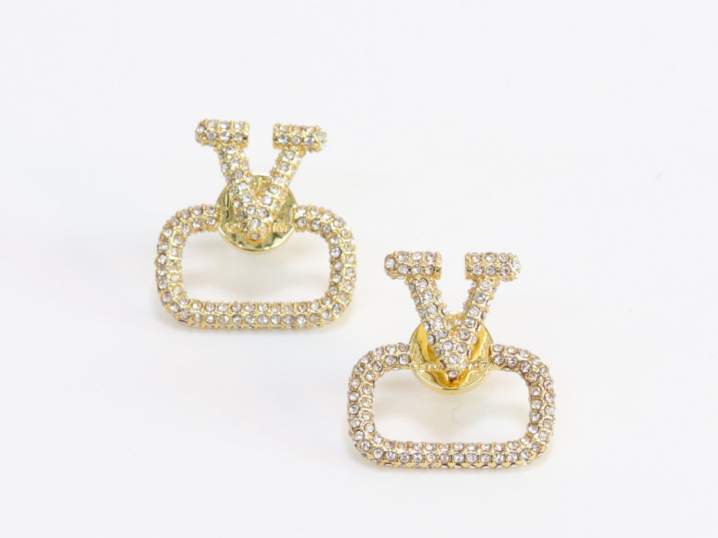 Alphabet V cz studs in gold finish