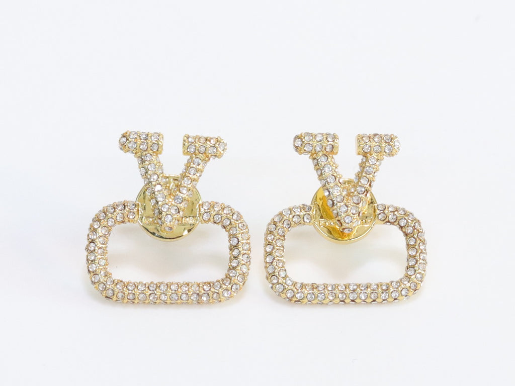 Alphabet V cz studs in gold finish